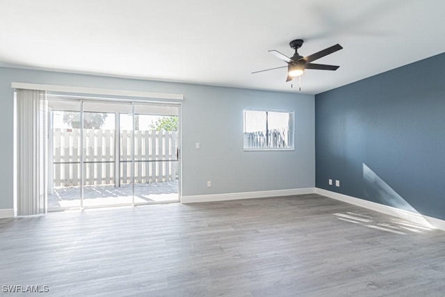 unfurnished room featuring wood-type flooring and ceiling fan