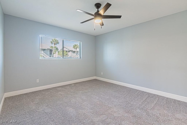 unfurnished room with carpet floors and ceiling fan