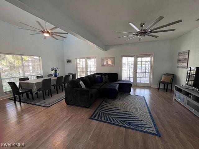 living room featuring beam ceiling and dark wood-type flooring