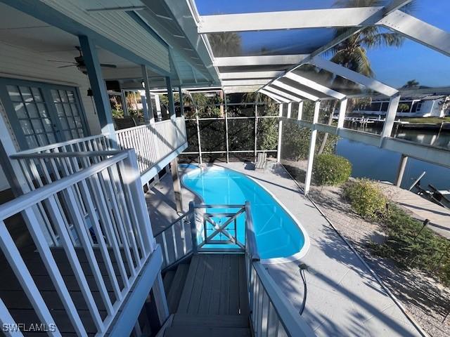 view of pool featuring ceiling fan