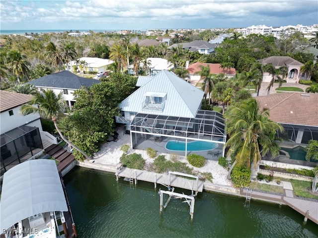 drone / aerial view with a water view