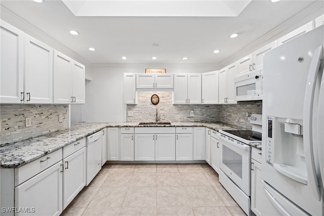 kitchen with light tile patterned floors, white cabinetry, a sink, light stone countertops, and white appliances