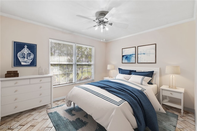 bedroom with ceiling fan and crown molding