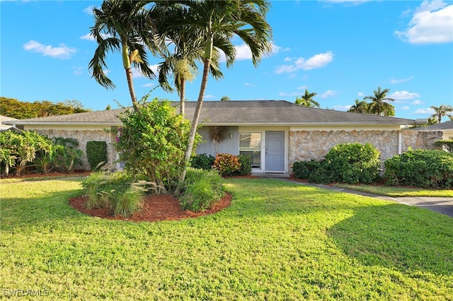 ranch-style home with a front yard