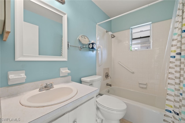 full bathroom featuring vanity, toilet, and shower / bathtub combination with curtain