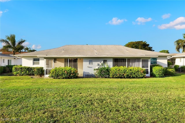 exterior space with a front lawn