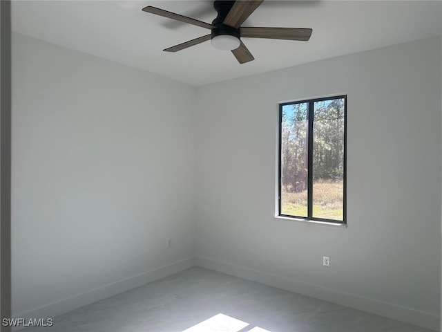 unfurnished room with ceiling fan