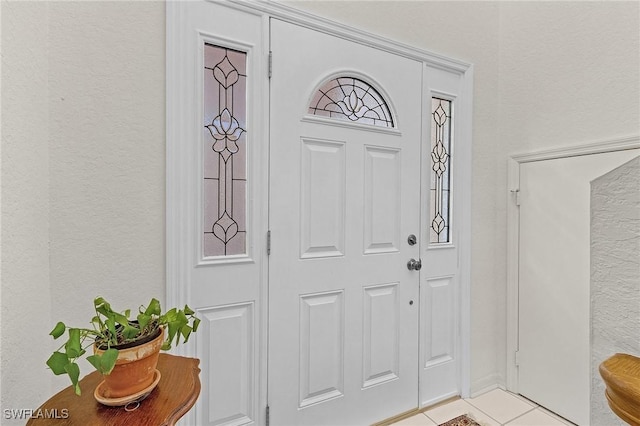 view of tiled foyer entrance