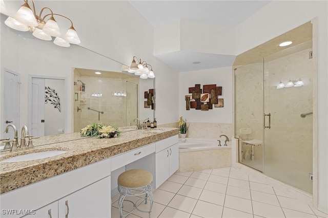 bathroom with tile patterned floors, vanity, and independent shower and bath