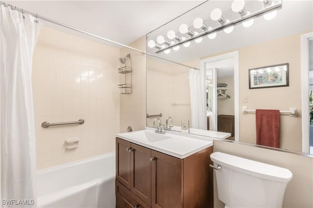 full bathroom featuring vanity, toilet, and shower / bath combo with shower curtain