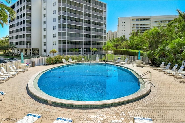 view of swimming pool featuring a patio