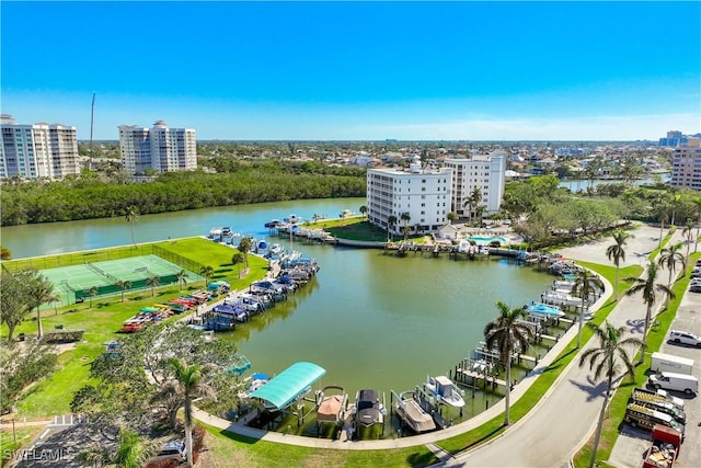 birds eye view of property with a water view