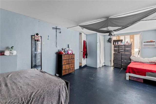 bedroom featuring a wall mounted air conditioner