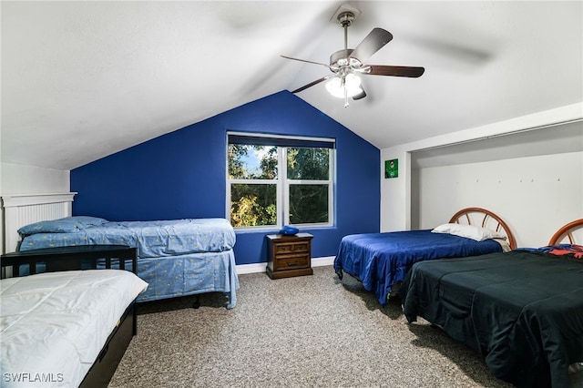 carpeted bedroom featuring lofted ceiling, ceiling fan, and baseboards