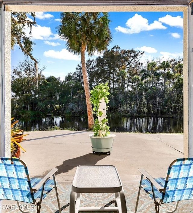 view of patio / terrace with a water view