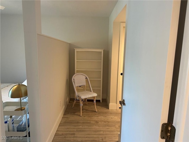 corridor featuring hardwood / wood-style flooring