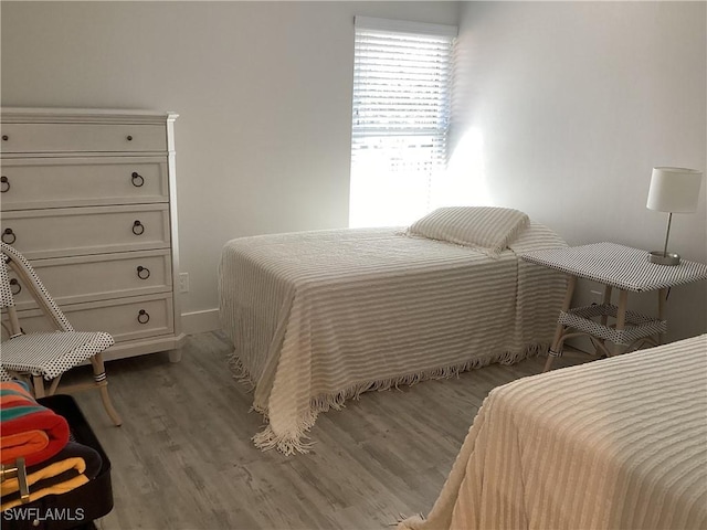 bedroom featuring light hardwood / wood-style floors