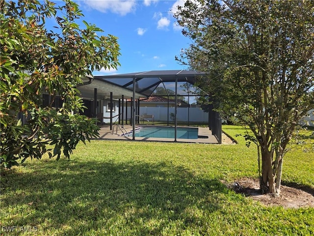 view of yard featuring a lanai and a patio