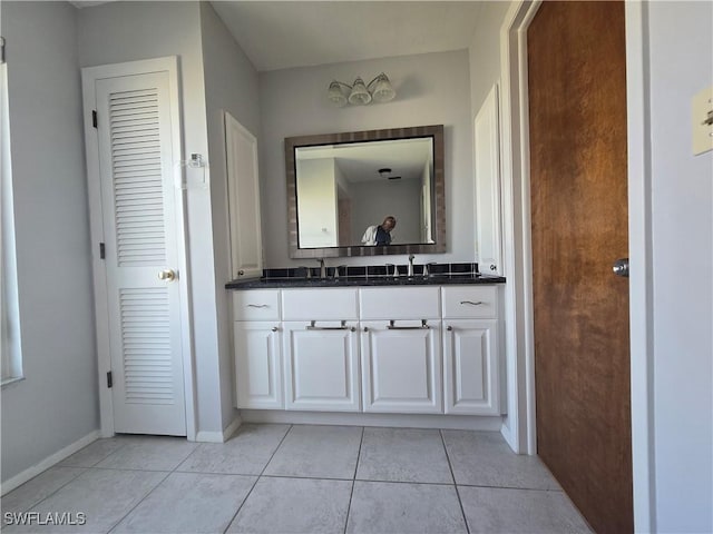 bathroom with vanity and tile patterned floors