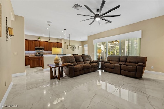 living room with ceiling fan