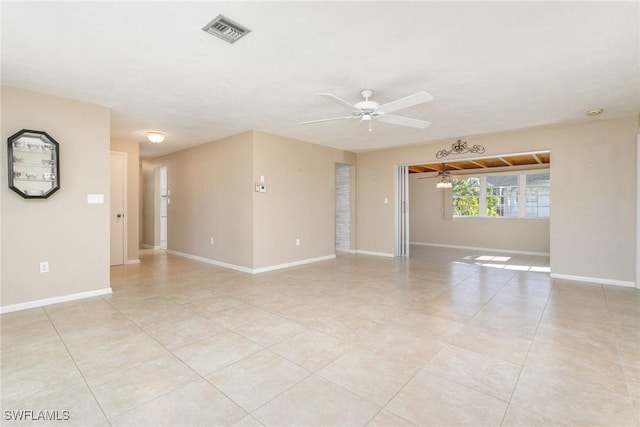 tiled empty room with ceiling fan