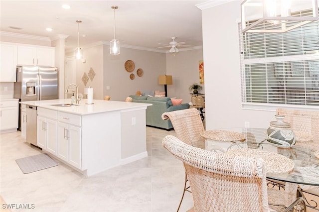 kitchen featuring white dishwasher, white cabinetry, sink, and ornamental molding