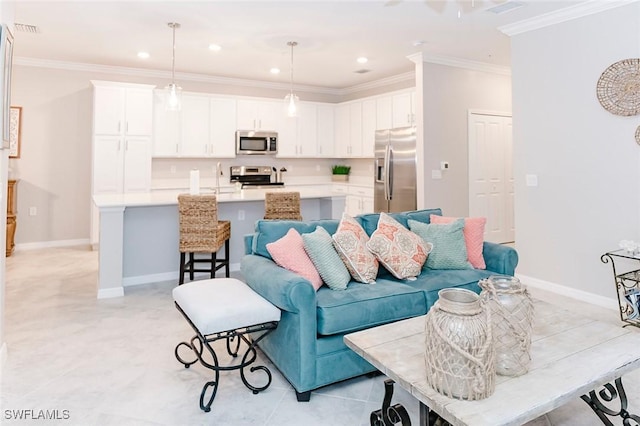 living room featuring crown molding