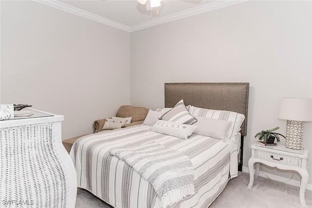 bedroom featuring carpet, ceiling fan, and crown molding