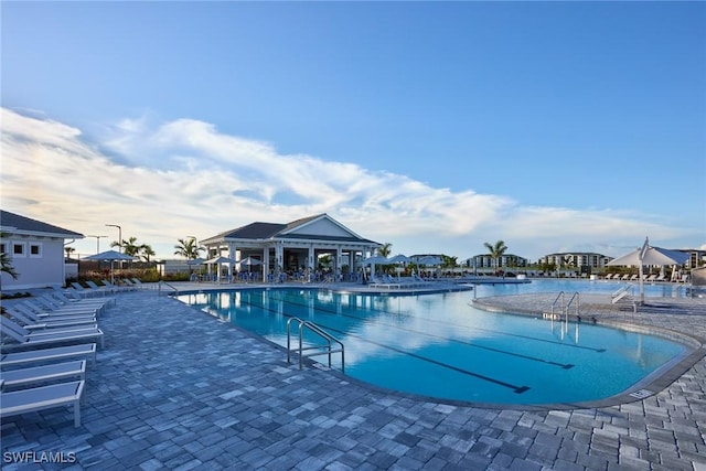 view of swimming pool with a patio area