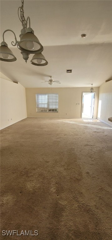 spare room with carpet and ceiling fan