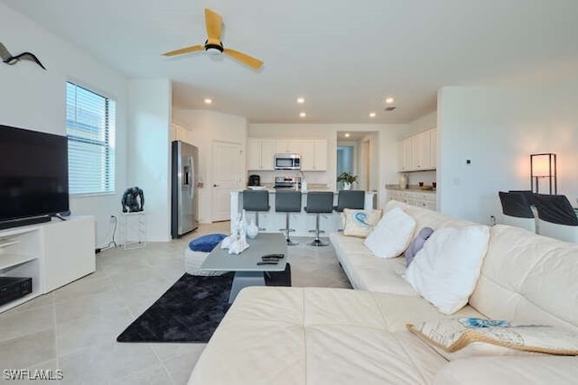 living room with ceiling fan