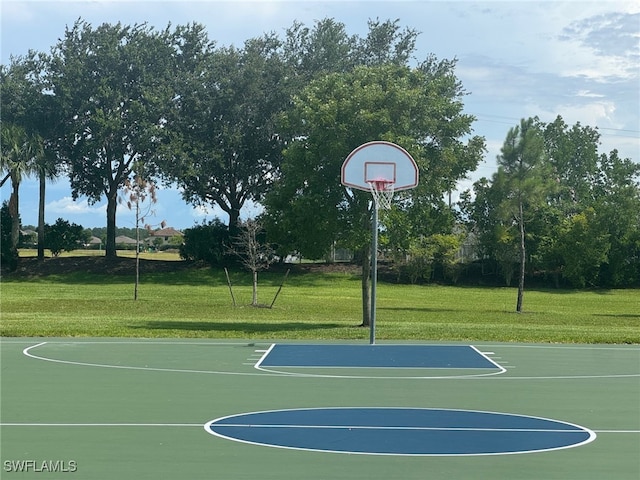 3426 Menores Way, Fort Myers, FL 33905 - view of basketball court featuring community basketball court and a yard