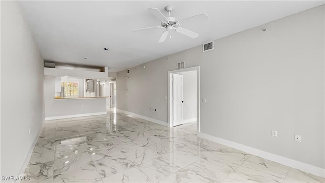 unfurnished room with ceiling fan