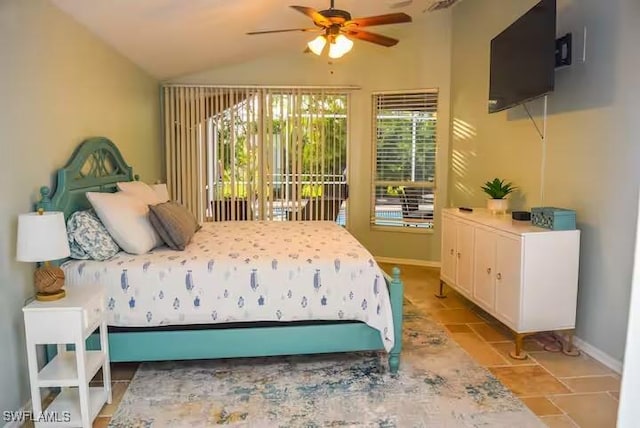 bedroom featuring ceiling fan and vaulted ceiling