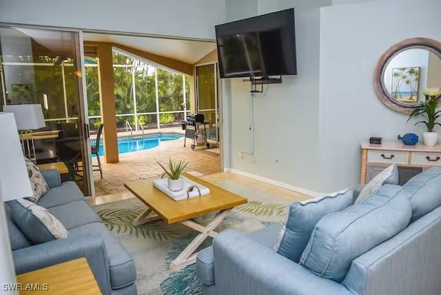 living room with lofted ceiling