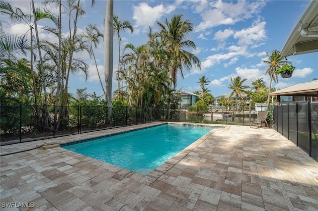 view of swimming pool featuring a patio