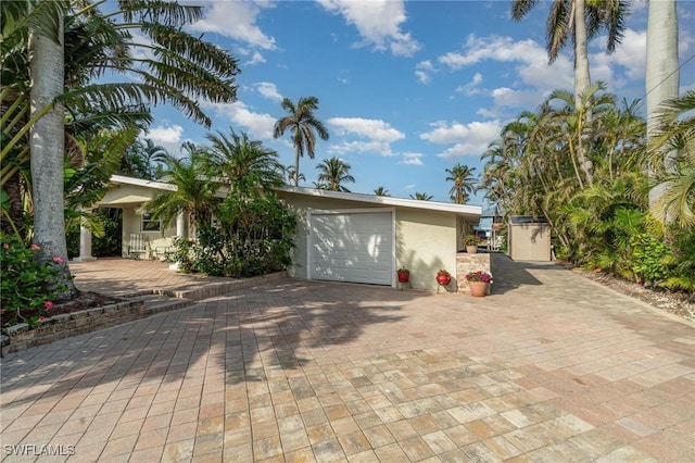 view of front of property with a garage