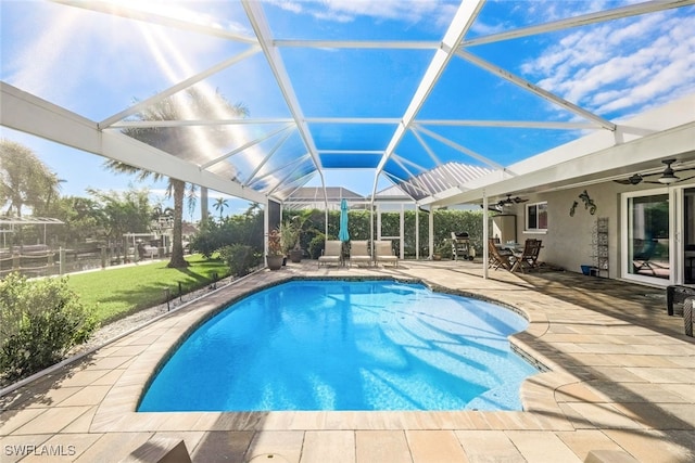 view of pool featuring a lanai and a patio area