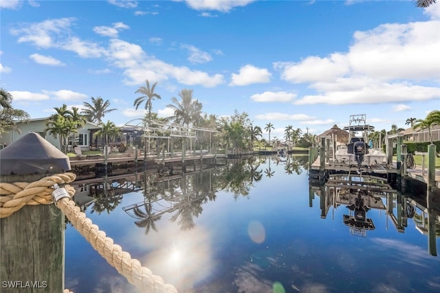 view of water feature with a dock and boat lift