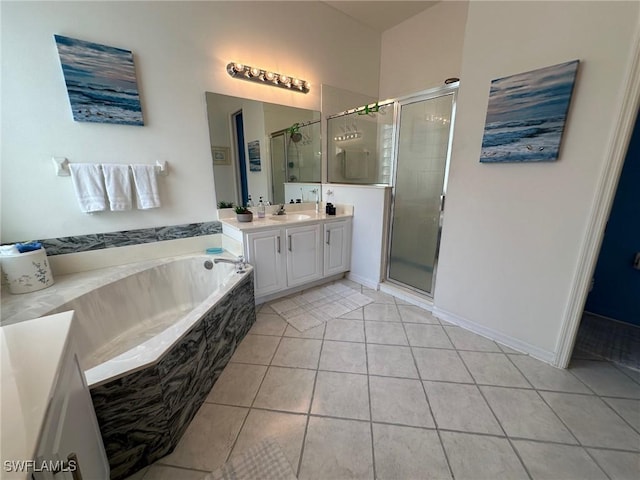 bathroom featuring separate shower and tub, tile patterned flooring, and vanity