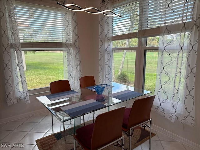 dining room with light tile patterned floors