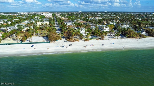 bird's eye view featuring a water view and a view of the beach