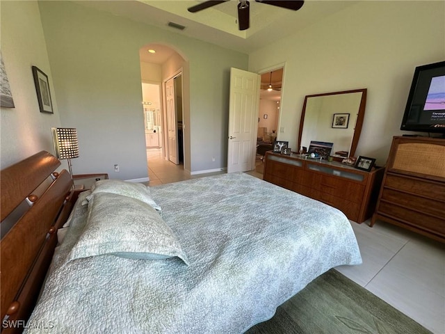 bedroom featuring light tile patterned floors and ceiling fan