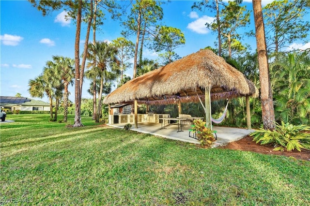 view of yard with a gazebo and a patio area