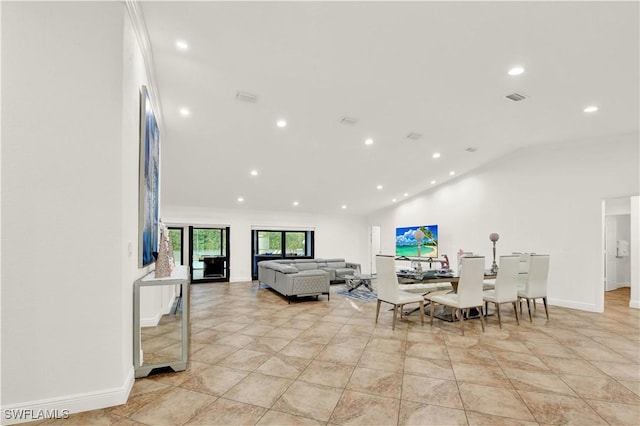 dining room with vaulted ceiling