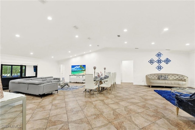 living room with lofted ceiling