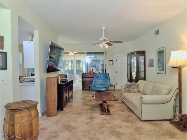 living room with ceiling fan