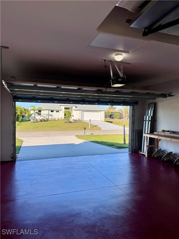 garage featuring a garage door opener