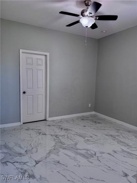 empty room featuring ceiling fan