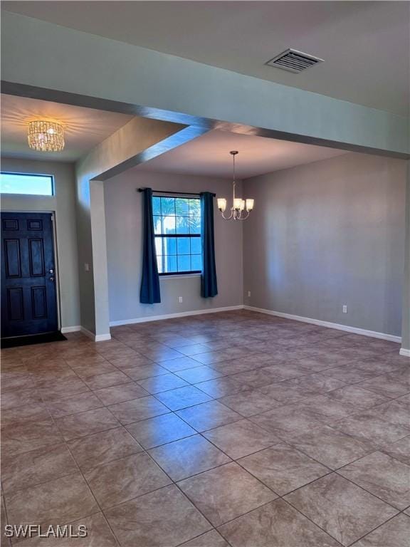 interior space featuring an inviting chandelier